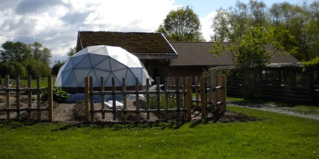 geodesic dome greenhouse on farm
