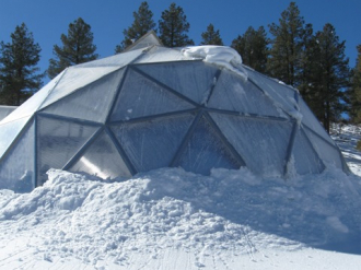 Winter greenhouse with snow