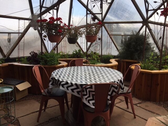 Patio Table in geodesic dome greenhouse