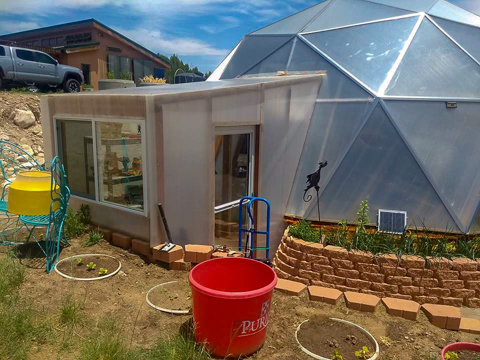matt larson outside shot - Growing Spaces Greenhouses Custom air-lock and storage for geodesic greenhouse
