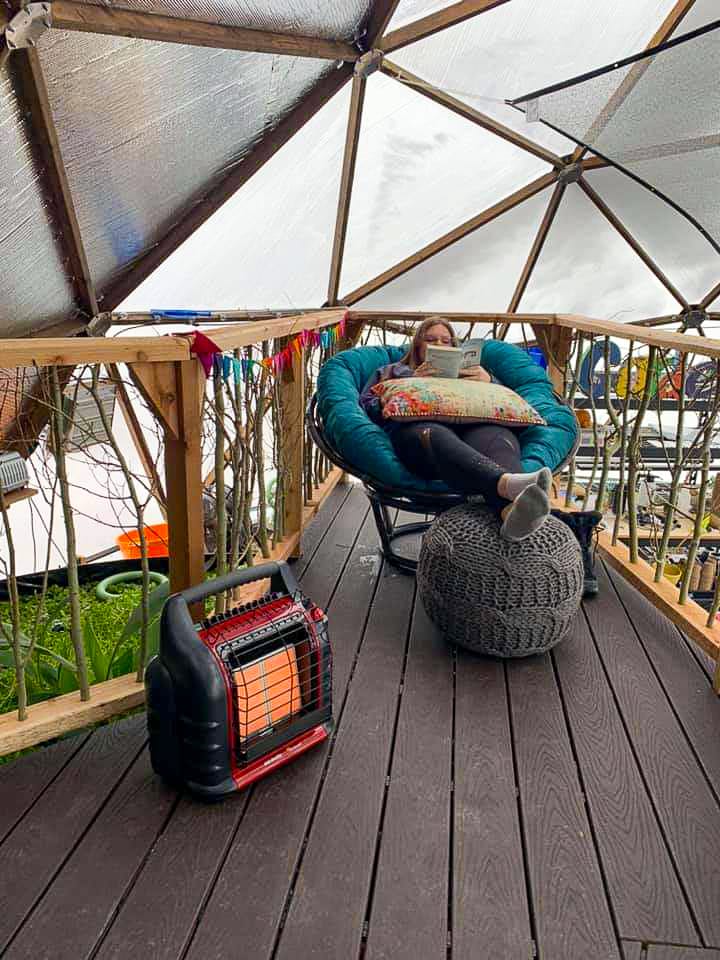 Deck above pond in geodesic dome