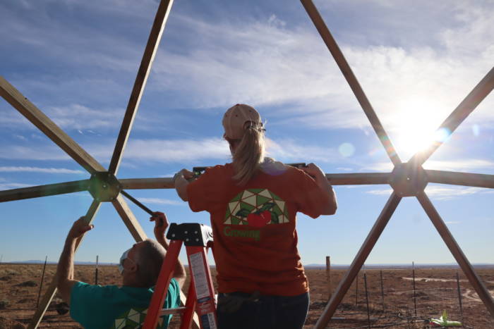 Liz Tingley working on a 26' Growing Dome build for Navajo Nation