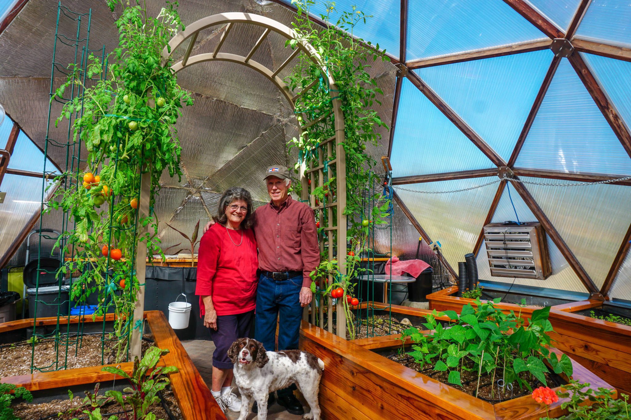 Retired couple in Growing Dome Greenhouse