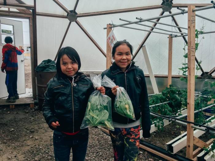 165867798_1424578824554564_4678417915903301055_n-1 - Growing Spaces Greenhouses children with fresh picked produce