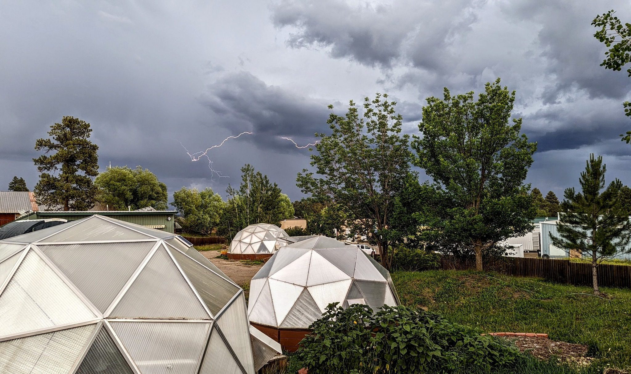 hail proof greenhouse - Growing Spaces Greenhouses thunderstorm over greenhouses