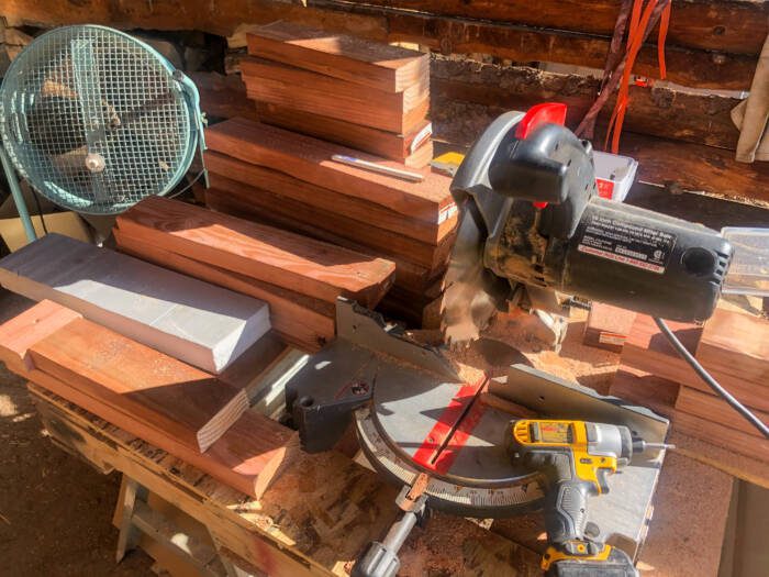 Materials for building garden beds for a backyard greenhouse