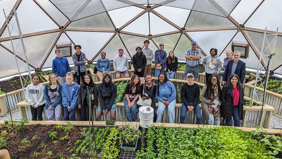 Andrews University Students at Unity Gardens Growing Dome Greenhouse
