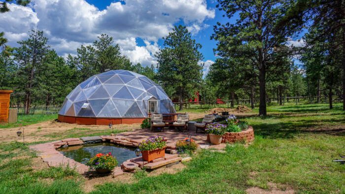 42' Growing Dome Greenhouse in a Backyard