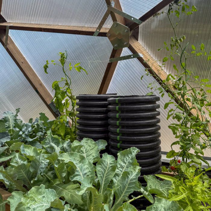 ClimateBattery - Growing Spaces Greenhouses Large black corrugated outlet tubes for a greenhouse climate battery